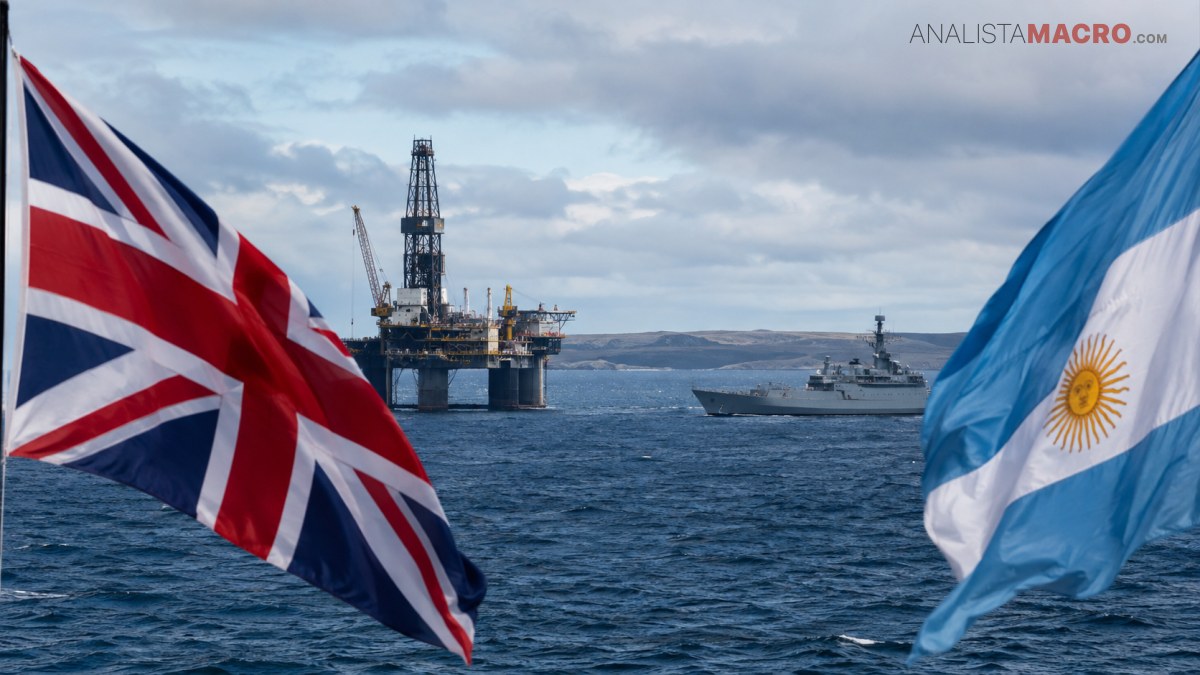 Banderas británica y argentina ondean frente a plataformas petroleras y un buque militar sobre el mar.